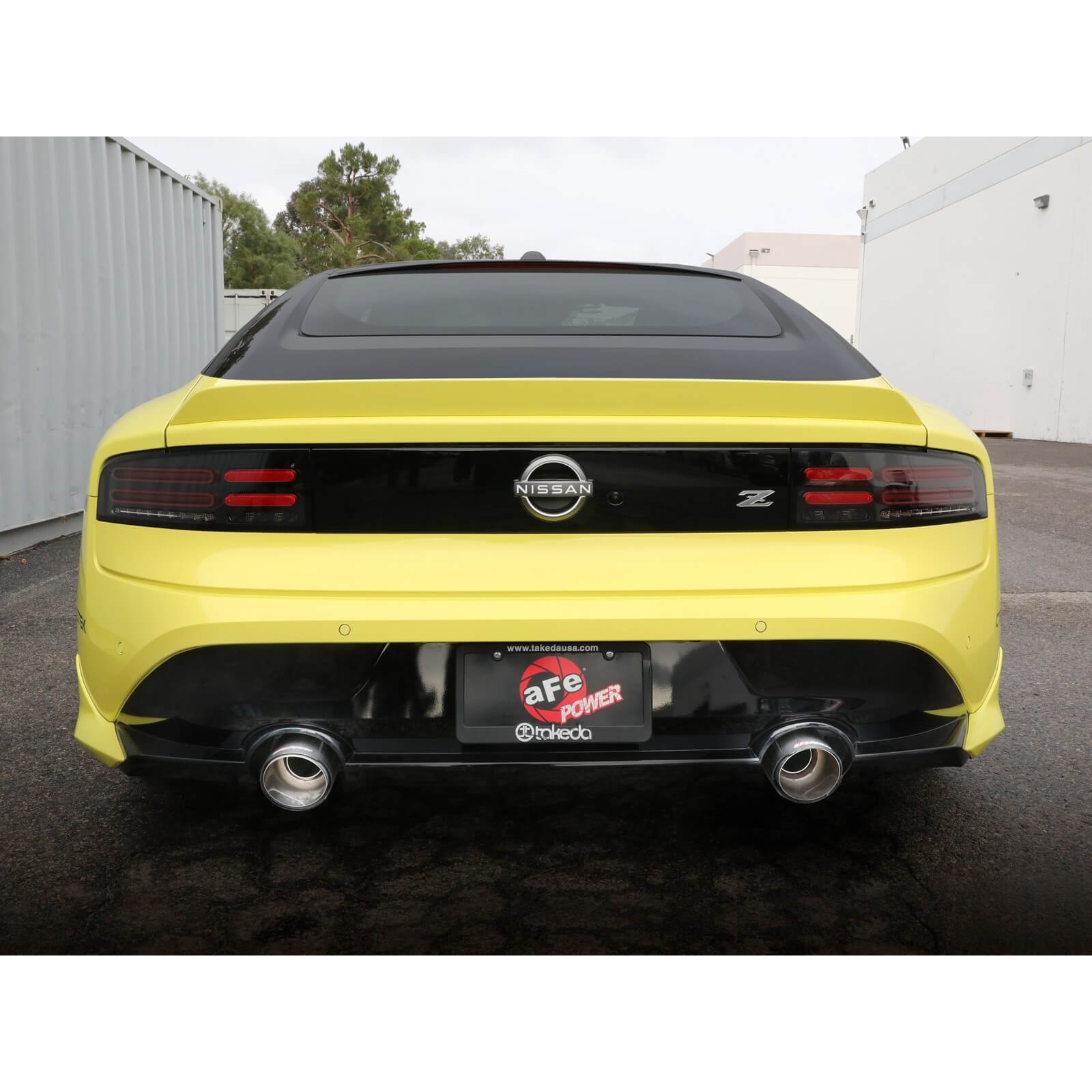 aFe Takeda Axle-Back Exhaust System w/ Carbon Fiber Tips (2.5in, 304SS), 2023-2025 Nissan Z - Angle 3