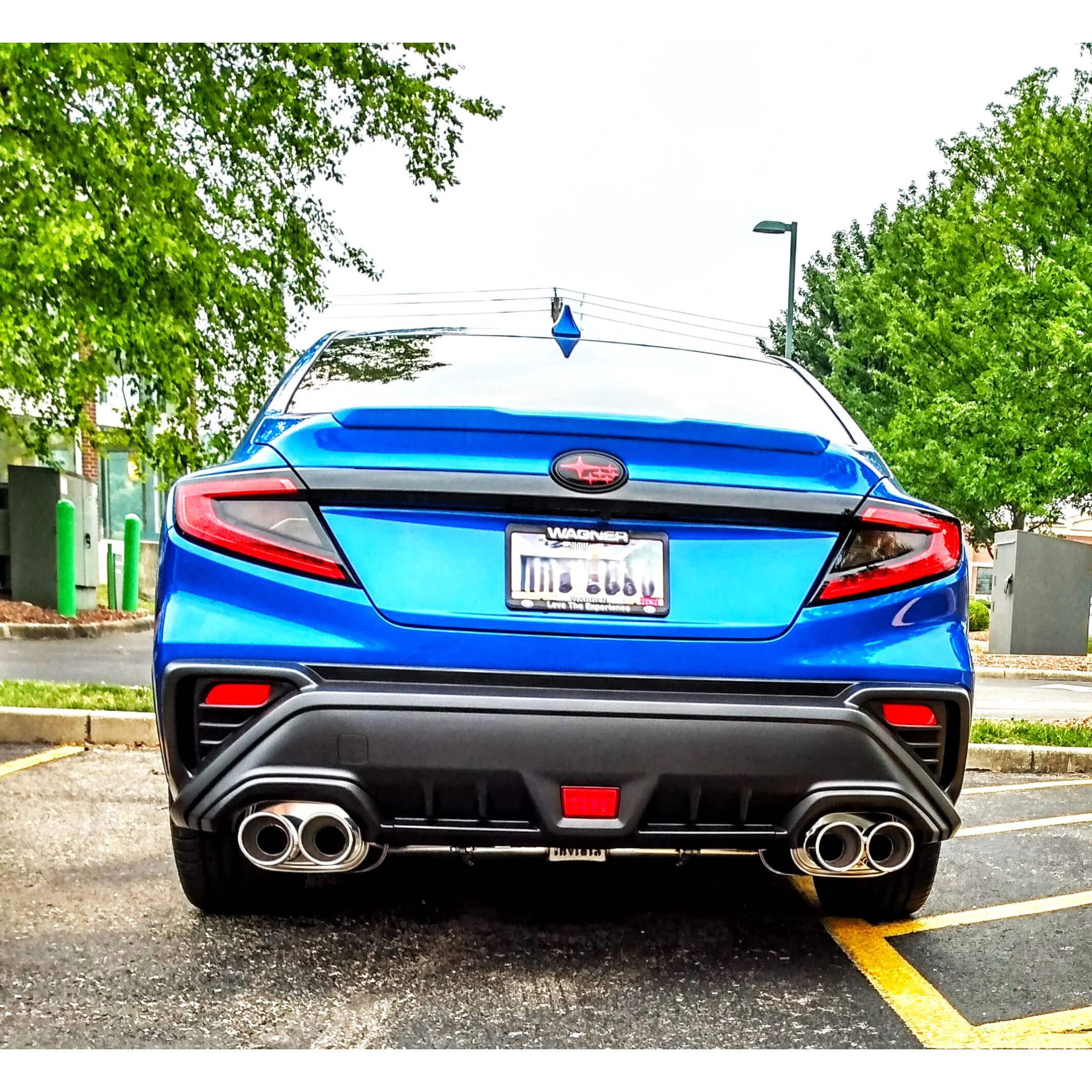Invidia Q300 Cat-Back Exhaust w/ Quad 110mm SS Tips, 2022-2026 WRX - Angle 4